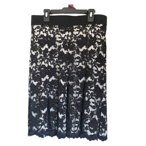 New, skirt. Black lace with off white under skirt.